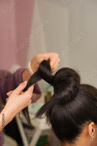 Hair Stylist Hands Form High Tuft Of Hair Learning To Create An