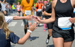 Marathon running race,runners support on road race, child's hand giving highfive, kid supporting athletes who run, sport concept