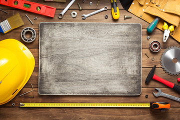 set of tools and instruments at wooden table