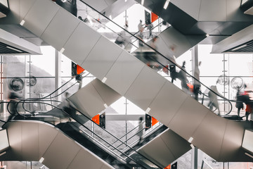 People walking on escalator