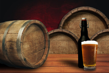 Poster - Wooden barrel background and glass of beer on a old oak table of wood.
