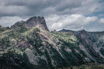 Wall Mural - view of a mountain valley on a cloudy day