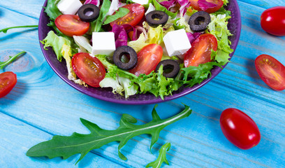 Wall Mural - Fresh vegetable salad with feta cheese. Proper nutrition.