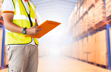 Workers Holding Clipboard Doing Inventory Management in Storage Warehouse. Cargo Supply Chain. Shipment Package Boxes. Shipping Warehouse Logistics.	