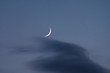 The new moon through the clouds