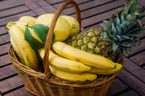 Fototapeta Kuchnia - basket with tropical fruits