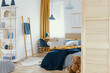 © Photographee.eu - Messy kid's bedroom with toys and wooden furniture real photo