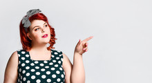 Pin Up A Female Portrait. Beautiful Retro Fat Woman In Polka Dot Dress With Red Lips And Old-style Haircut