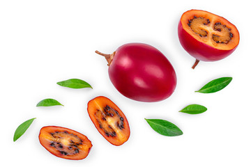 Fresh tamarillo fruit with leaves isolated on white background. Top view. Flat lay