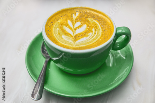 Cuadros en Lienzo Ayurvedic turmeric latte coffee cup