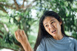 © anut21ng Stock - Young asian woman looking lost hair in hand . problem lost hair
