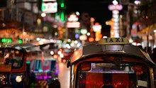 4K Traditional Thai Taxi Tuk Tuk Awaits Tourists Along The Road At Chinatown