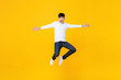 © Atstock Productions - Young Asian man in casual clothes jumping