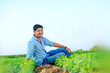 © PRASANNAPIX - Young indian farmer at field