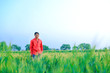 © PRASANNAPIX - Young indian farmer at field