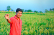 © PRASANNAPIX - Young indian farmer at field