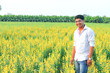 © PRASANNAPIX - Young indian farmer at field