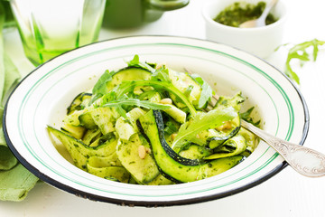 Wall Mural - zucchini salad with arugula pesto.