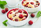 Fototapeta Do przedpokoju - Cherry clafoutis - traditional French sweet fruit dessert.