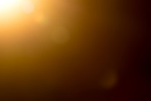 Lens Flare And Light Beam On Dark Background Yellow Color, Photo From Lens Camera