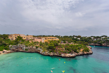 Wall Mural - Beautiful bay of Cala Ferrera with turquoise water and villas in Cala d'Or, Mallorca