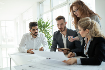 Group of architects working together on project