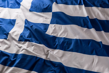 Wall Mural - Greece flag waving in the wind - top of view