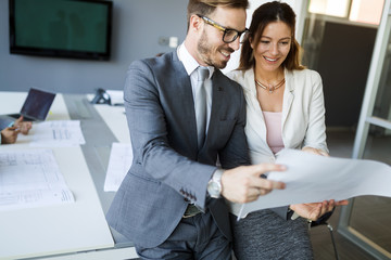 Picture of business colleagues talking in office