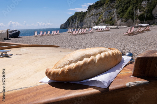 Cuadros en Lienzo Cornish pasty on boat , beach location in West Country in summer with deck chair