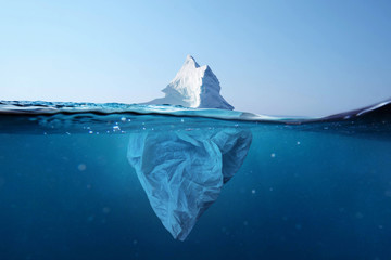 Wall Mural - iceberg - plastic bag with a view under the water. pollution of the oceans. plastic bag environment 