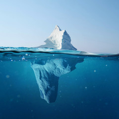 Wall Mural - beautiful iceberg in the ocean with a view under water. global warming concept. melting glacier