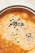 © Jeff Wasserman/Stocksy - Close up of coffee in mug