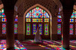© Bisual Studio/Stocksy - Anonymous woman inside of colorful oriental mosque