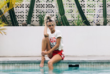 Summer Fashion Portrait Of Young Sexy Rebel Girl Posing By Swimm