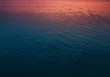 © MyMicrostock/Stocksy - Sea background at sunrise