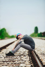 Young Urban Man On The Railroad