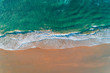 © Marco Govel/Stocksy - Aerial view of a wild beach at sunset
