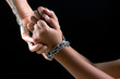 © Phongsakorn - Child hands were tied with a chain. Stop Violence, Terrified,Children violence and abused concept.  Human Rights Day concept with copy space for advertisers.