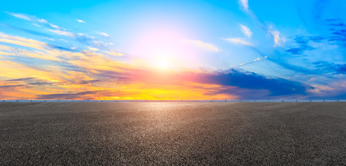 Asphalt road and sunset sky,panoramic view