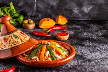 Wall Mural - Vegetable tagine with almond and chickpea couscous.