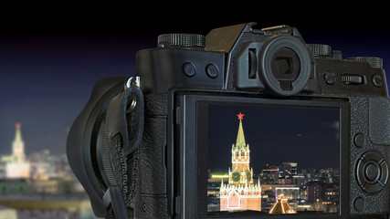 Wall Mural - moscow city russian kremlin and red square skyline panorama at night blurred background in digital photo camera display close up view of kremlin clock spasskaya tower tourist sightseeing landscape