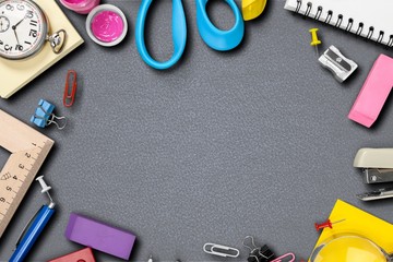 Poster - Colorful school supplies on wooden table background