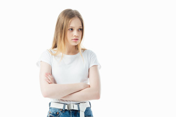 Wall Mural - upset and offended teenage girl with crossed arms isolated on white