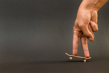 Fingerboard. A small skateboard for kids and teenagers to play w