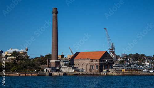 Factory Brick Smoke Stack At Historic Dockyard And Boat - 