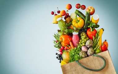 Wall Mural - Bag filled with vegetables and glass juice smoothies