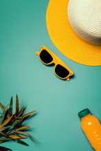 Straw Hat And Sunglasses In Summertime Holiday Vacation Concept