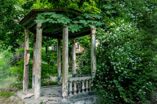 Old Ruined Gazebo In The Thickets Of Blooming Jasmine. Retro Vintage Style.