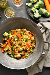 Wall Mural - Stir-fry noodles with vegetables in wok