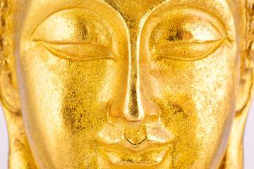 gold buddha portrait, macro close up buddha face portrait, closed eyes buddha.